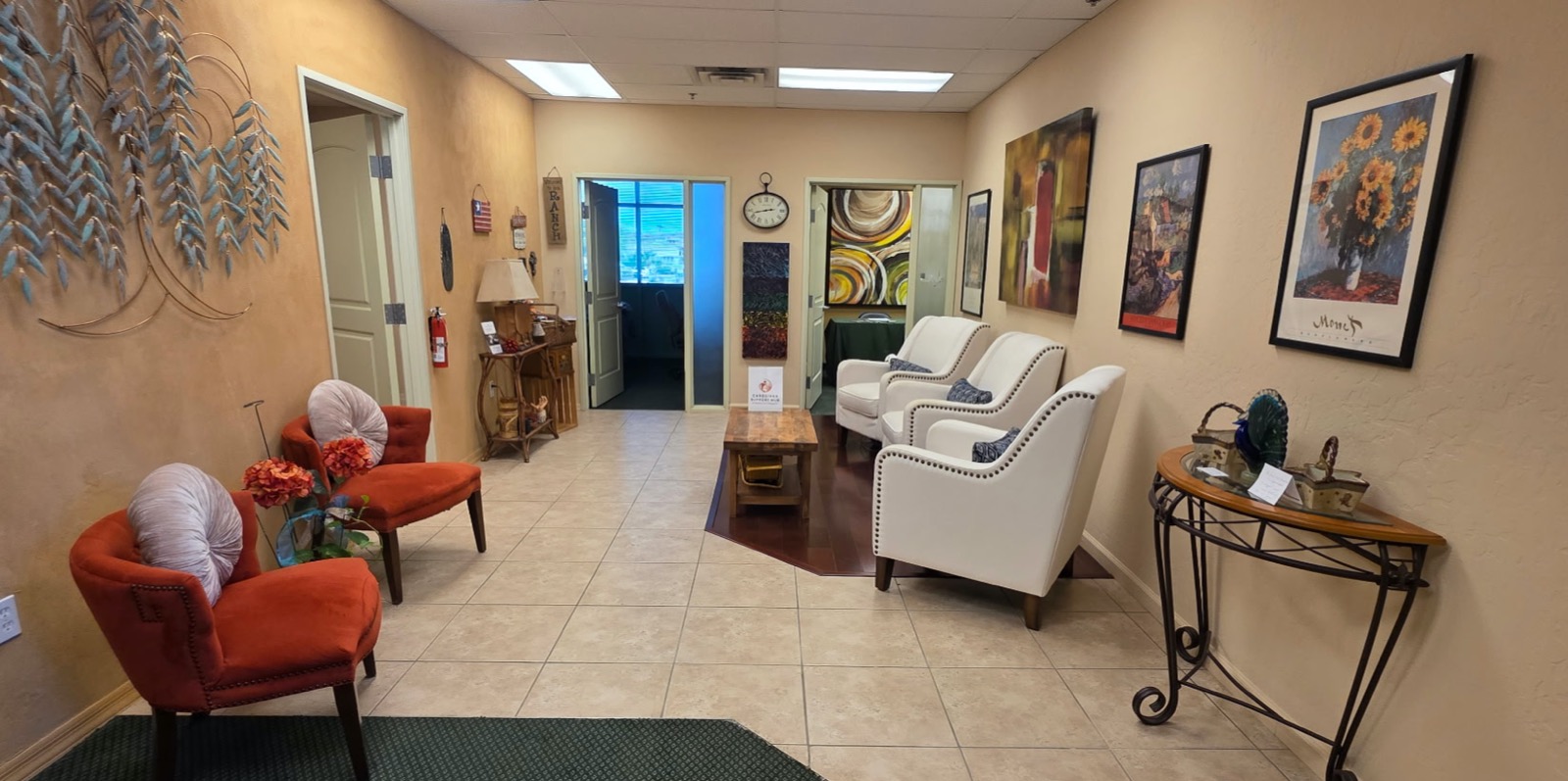 Inside the Caregiver Support Hub &mdash; comfortable chairs, warm lighting and a welcoming gathering space